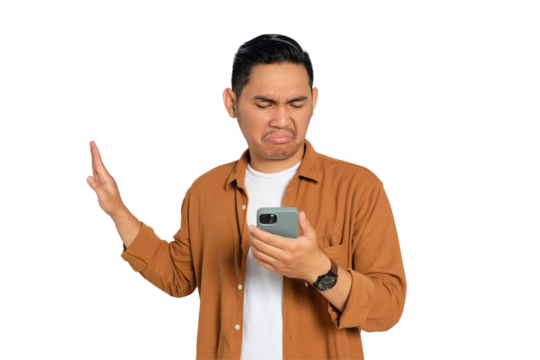Handsome young Asian man in casual shirt looking at smartphone reading news and doing stop sign with hand isolated on transparent background