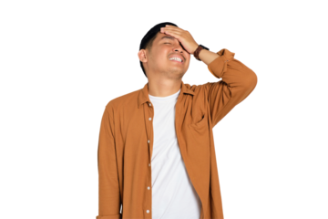 Forgetful young Asian man in casual shirt slapping hand on head having duh moment isolated on transparent background