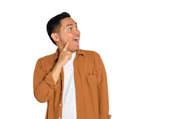Side view of excited young Asian man in casual shirt finding solution to problem isolated on...