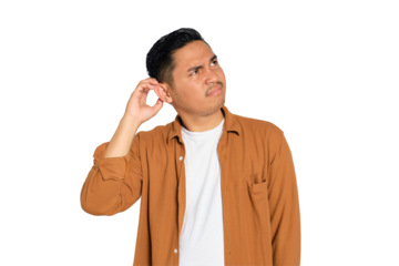 Doubtful young Asian man in casual shirt scratching head, thinking, trying to find solution isolated on transparent background