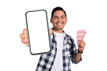Easy online money transfer concept. Happy young Asian man in casual shirt holding smartphone with blank screen and money isolated on transparent background