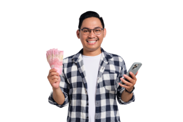Online profit. Happy young Asian man in casual shirt holding smartphone and money, enjoying financial success isolated on transparent background