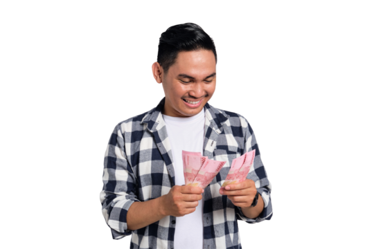 Successful financial planning. Smiling young Asian man in casual shirt counting money with happy facial expression isolated on transparent background