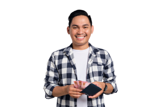 Successful financial planning. Smiling young Asian man in casual shirt taking money from wallet with happy facial expression isolated on transparent background