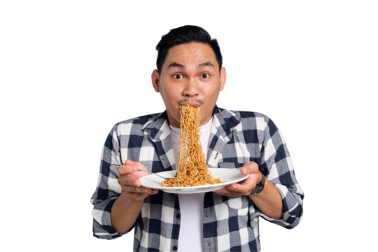 Happy young Asian man in casual shirt enjoying eating noodles with fork isolated on transparent background