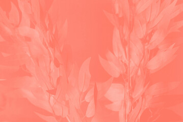 Dreamy blurred pink coral red gradient background with merging in a pale colored flowers composition. Peaceful or serene backgrounds. Template banner. Frame with soft pastel floral pattern