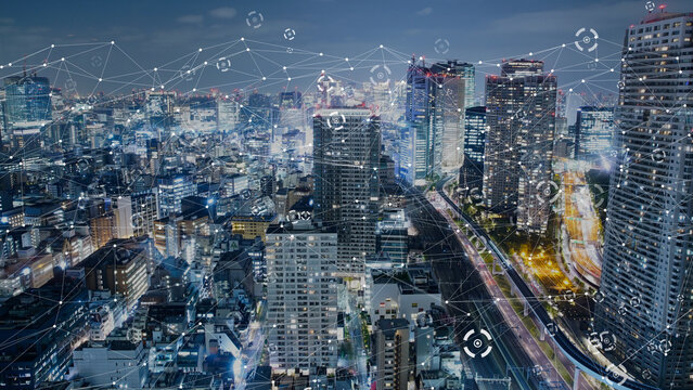 インターネットとネットワークをイメージした都市風景