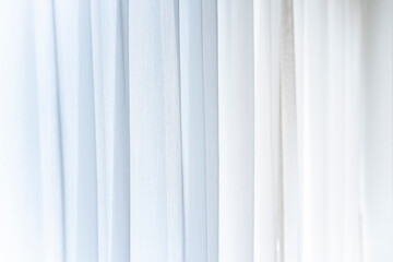 Obraz premium 浅いピント面で撮影した白いレースカーテン