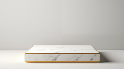 Marble podium with gold trim against a plain white background studio shot