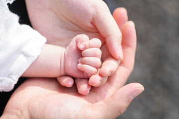 In June 2025, a Japanese couple in their early twenties brings their one-month-old baby to a shrine...