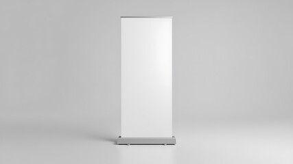 A clean modern empty white roll up banner stand mockup with a silver frame and base on a light gray background