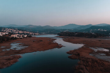 aerial view of coastal wetland in san marino during soft twilight