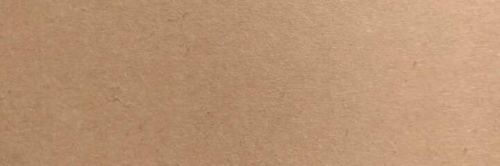 Brown paper texture background. Light brown kraft paper texture banner background. Panorama view photo