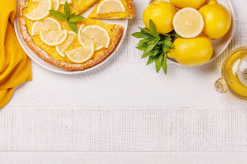 Delicious lemon tart with golden crust and smooth, glossy lemon filling