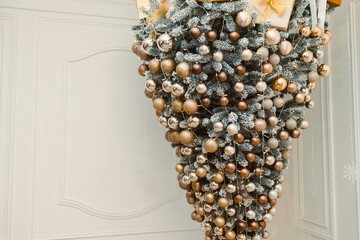 Explore the enchanting beauty of a Unique Upside Down Christmas Tree, adorned with Elegant Gold and...