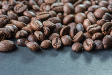 Close up of coffee beans are the background.