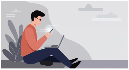 a man sitting on the ground using his laptop