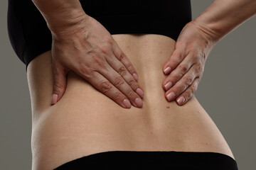 Relieving Lower Back Pain with Gentle Hand Pressure