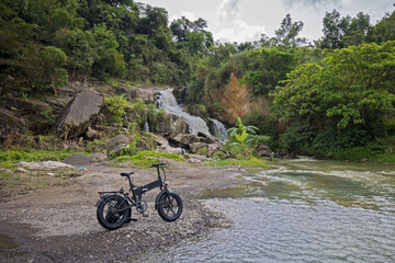 ebike e-mountain bike at a waterfall offroad
