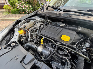 A Detailed View of a Contemporary Automotive Engine Compartment Showcasing Its Efficient Design and...