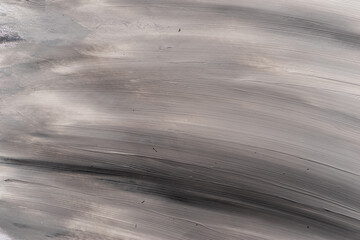 黒と白の混ざった絵の具の背景	