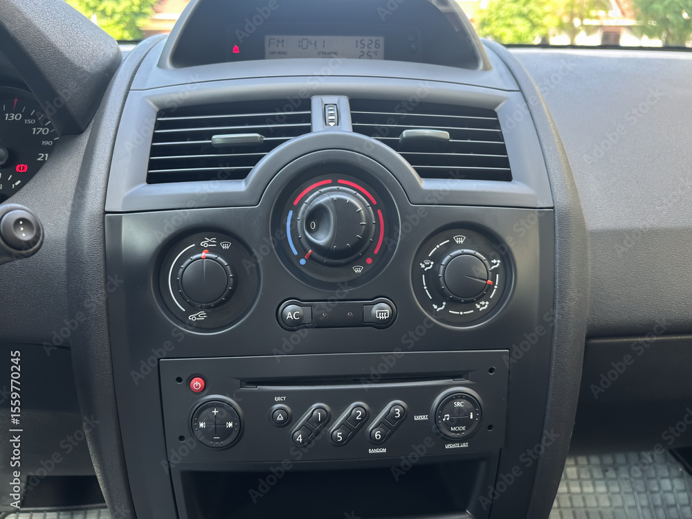 Poster the modern car dashboard is equipped with advanced controls that enhance the driving experience, fea