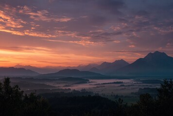 Naklejka premium sunset over the mountains