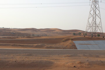 Dubai desert safari in sunset light. Off road safari in sand desert, Empty Quarter Desert in United Arab Emirates. Off roader on dunes in Rub al Khali desert.