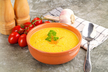 Vegetarian corn cream soup served parsley