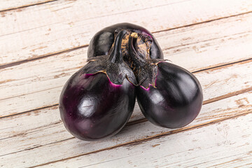 Raw violet and black eggplant