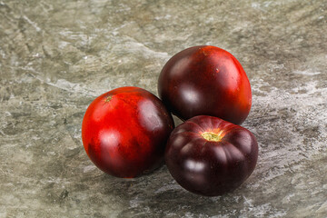 Black ripe juicy organic tomato