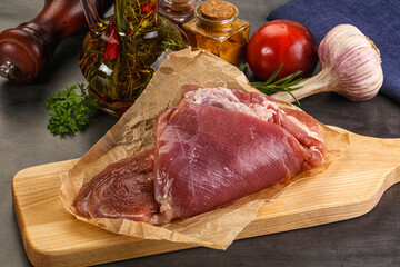 Raw uncooked turkey thigh fillet