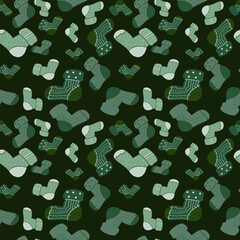 Seamless vector pattern of cozy green and gray socks with various patterns on a dark green background. Ideal for winter fashion, festive textiles, digital decor, and warm, comfortable designs.