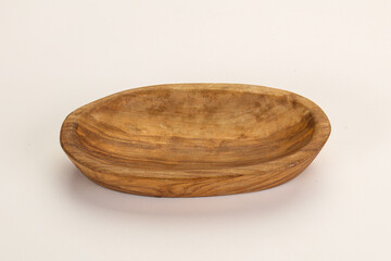 Empty natural wooden bowl isolated