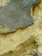 This image showcases textured rock surfaces with abstract patterns in natural colors, highlighting...