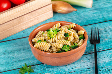 Italian vegan pasta fusilli with broccoli