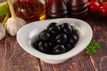 Mediterranean marinated Black olives in the bowl