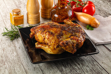 Baked in oven whole chicken with spices