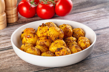 Baked small baby potato with herbs