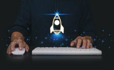 Startup business start-up with technology background as a rocket image conveying the idea of...