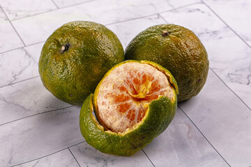 Ripe green organic orange citrus