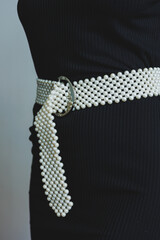 Adorn your stylish wardrobe with this Elegant White Pearl Beaded Belt, designed specifically for...