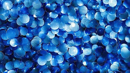 Close-up of blue circular confetti - Powered by Adobe