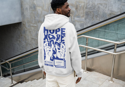 Mockup Of Man Wearing Customizable Hoodie, Rear View