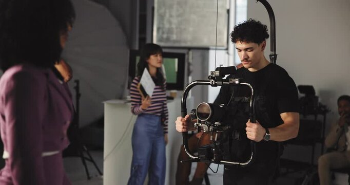 Team, people and movie slate for shoot, actor and process in studio, production or behind the scene. Media, group and videographer with camera for filming, creative and filmmaker with equipment