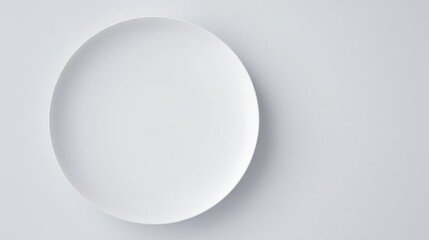 Curved Ceramic Plate on Light Gray Background with Soft Top-Down Lighting