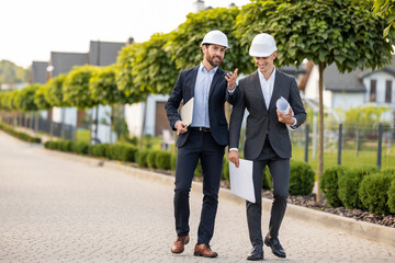 Engineers coordinating project with digital tools