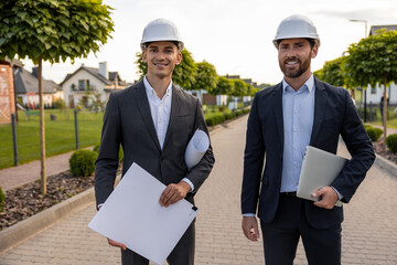 Engineers coordinating project with digital tools