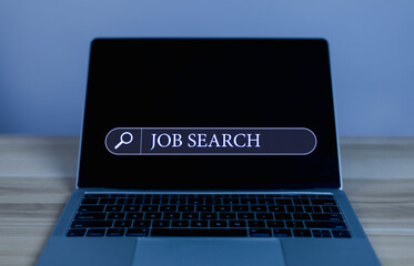 Man using laptop to search for job. Job search concept. People searching for job vacancies or...
