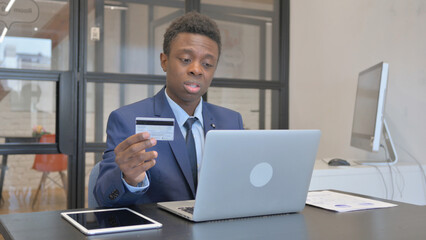 Young African Businessman Having Online Banking Problems